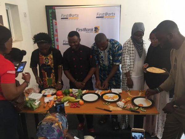Haneefat teaches participants how to make food with art