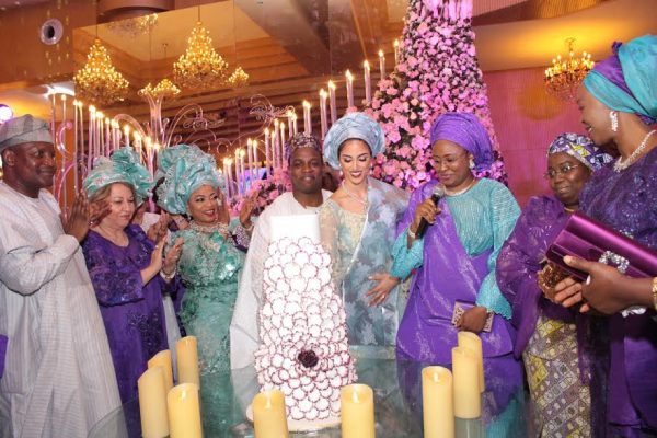 From left: President, Dangote Group, Alhaji Aliko Dangote; Grandmother of the Bride, Mrs. Monir; Groom's mother, Mrs. Folorunso Alakija, Groom, Folarin Alakija and Bride, Nazanine; Wife of the President, Mrs. Aisha Buhari; Deputy Governor, Lagos State, Mrs. Oluranti Adebule and Wife of the Senate President, Mrs. Oluwatoyin Saraki; during the cutitng of cake at the wedding ceremony of the Son of Mrs. Alakija held at Oriental Hotel and Suite in Lagos..... yesterday PHOTO BY AKINWUNMI IBRAHIM