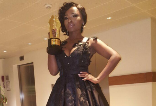 Meg Otanwa poses with her AMVCA trophy | TheCable.ng
