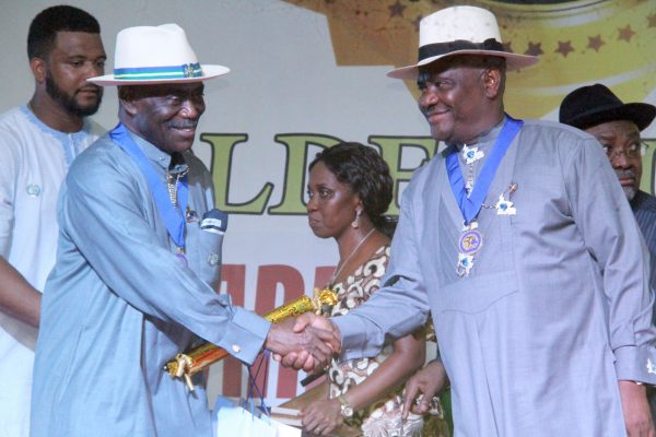 R-L Rivers State Governor, Nyesom Wike Presenting the Grand Service Star of Rivers State Award [GSSRS] to Dr Peter Odili, Former Governor of Rivers State during the Rivers State Golden Jubilee Awards and houours Night Weekend in Port Harcourt. Photo: Nwankpa Chijioke