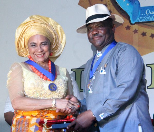 R-L Rivers State Governor, Nyesom Wike Presenting the Governor's Medal of Hounor Award [GMH] to Annkio Briggs during the Rivers State Golden Jubilee Awards and houours Night Weekend in Port Harcourt. Photo: Nwankpa Chijioke
