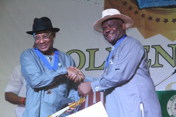 R-L Rivers State Governor, Nyesom Wike Presenting the Grand Service Star of Rivers State Award [GSSRS] to Sir Celestine Omehia Former Governor of Rivers State during the Rivers State Golden Jubilee Awards and houours Night Weekend in Port Harcourt. Photo: Nwankpa Chijioke