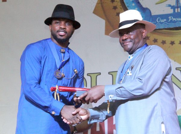R-L Rivers State Governor, Nyesom Wike Presenting the Distinguish Service Star of Rivers State Award to Joseph Yobo Former Super Eagles Captain during the Rivers State Golden Jubilee Awards and houours Night Weekend in Port Harcourt. Photo: Nwankpa Chijioke