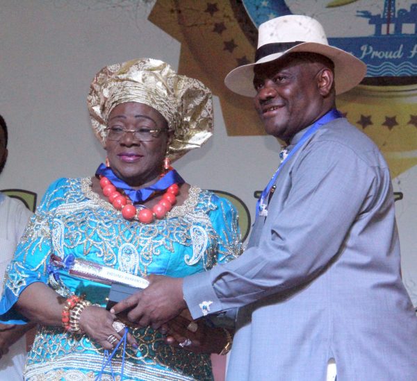 R-L Rivers State Governor, Nyesom Wike Presenting the Distinguish Service Star of Rivers State Award [DSSRS] to Dr Ndi Okereke Onyiuke, Former DG of Nigerian Stock Excchange during the Rivers State Golden Jubilee Awards and houours Night Weekend in Port Harcourt. Photo: Nwankpa Chijioke