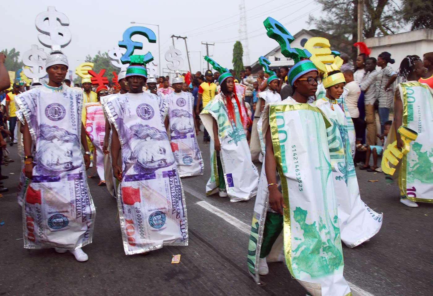 Members of Freedom Band wearing Foreign Currency Costume during the Main Event of the 2017 Carnival Calabar in Cross River State Yesterday. Photo: Nwankpa Chijioke