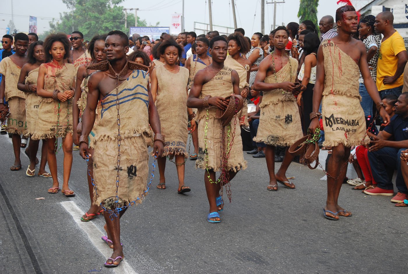Members of Bayside Band wearing a Costume Depicting Slavery during the Main Event of the 2017 Carnival Calabar in Cross River State Yesterday. Photo: Nwankpa Chijioke