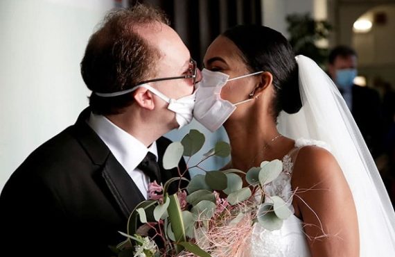 Couple wed in face masks at ceremony with no guests in Italy – world's worst hit country