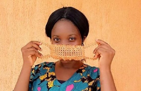 Reactions as student makes face masks with beads