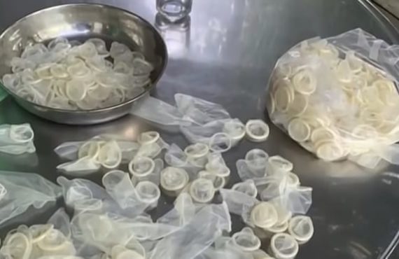 EXTRA: Vietnam police bust dealers selling 'recycled condoms'