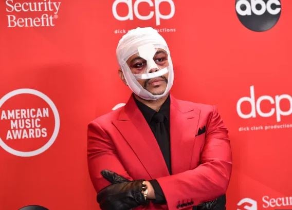 The Weeknd attends 2020 AMAs with bandaged face