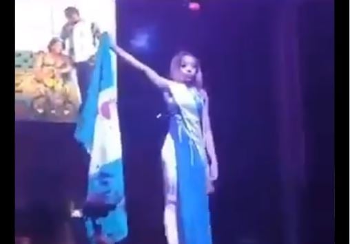VIDEO: Nigeria's representative at Miss Africa Russia walks runway with blood stained flag
