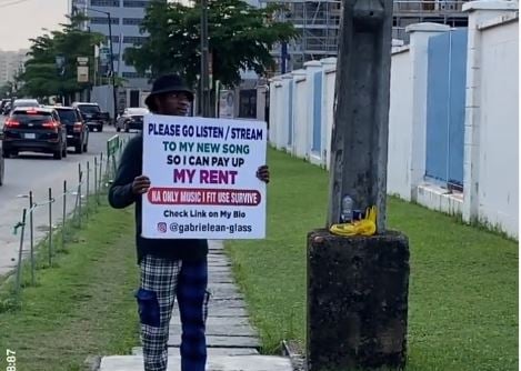 EXTRA: 'I need to pay my rent' -- artiste hits streets of Lagos to market his song