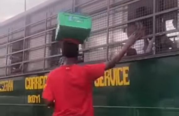 VIDEO: Lagos hawker turned viral sensation for giving money to inmates