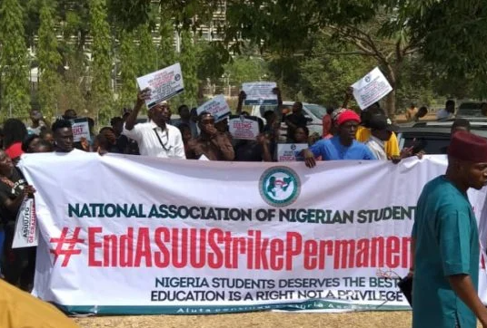 PHOTOS: 'End ASUU strike permanently' -- students protest in Abuja