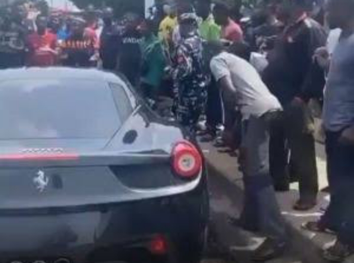 Burna Boy crashes Ferrari, survives accident