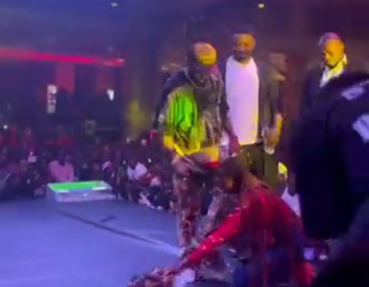 WATCH: Davido gifts female fan his shoes, N2m on stage