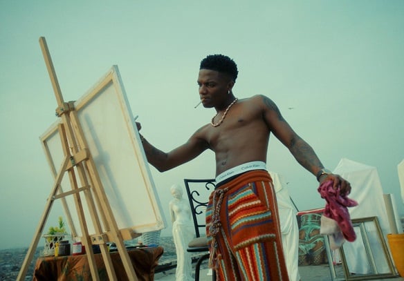 WATCH: Wizkid turns painter in 'Money and Love' visuals