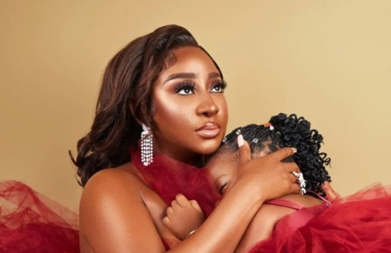 Picture of Ini Edo and a baby