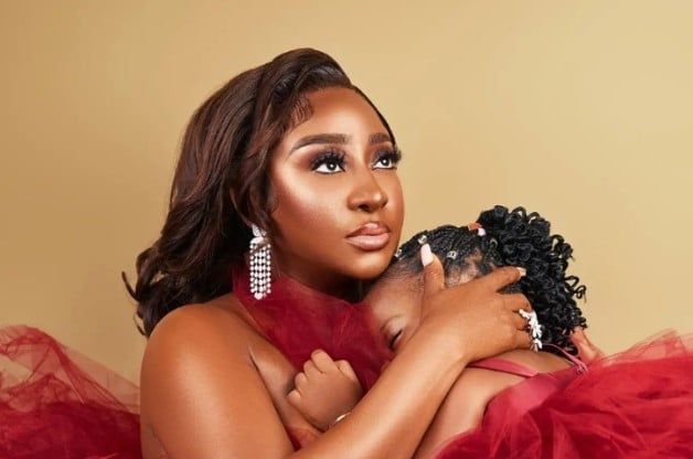 Picture of Ini Edo and a baby
