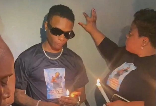 VIDEO: Grief-stricken Wizkid holds candlelight vigil for mum
