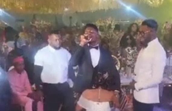 Reactions as actress Ekene Umenwa kneels before Moses Bliss on wedding day