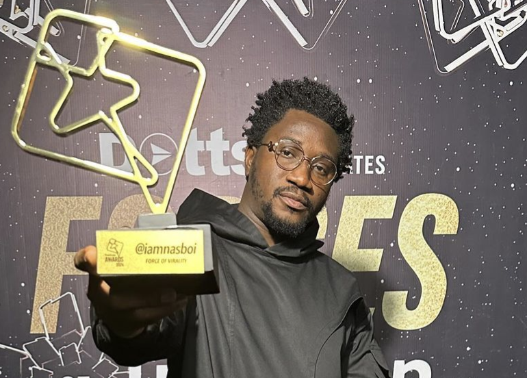 Nasboi shows off his Trendupp award