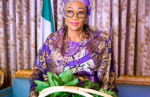 Remi Tinubu holds basket of vegetables