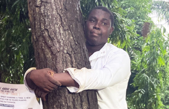 Abdul Hakim Awal, the 23-year-old journalist from Kumasi, Ghana, has broken the world record for the longest time to hug a tree