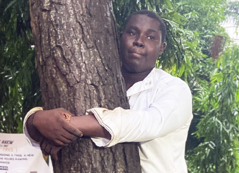 Abdul Hakim Awal, the 23-year-old journalist from Kumasi, Ghana, has broken the world record for the longest time to hug a tree