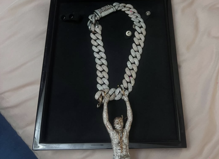 Burna Boy gifts Seun Kuti custom diamond chain of Fela