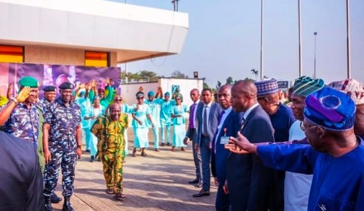 VIDEO: Papa Ajasco meets ‘long-time friend’ Tinubu at Lagos airport